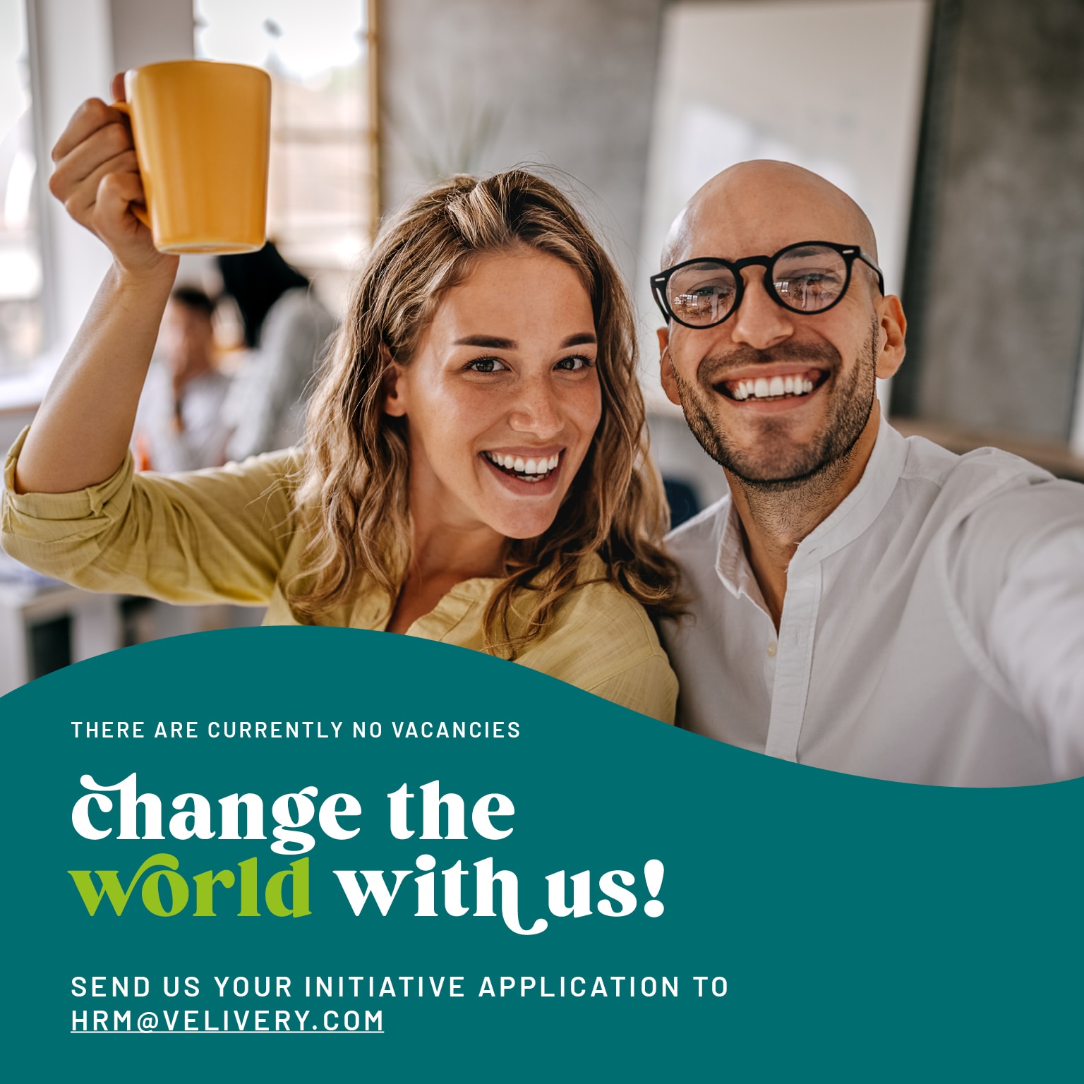 Two smiling people in an office with a call for initiative applications