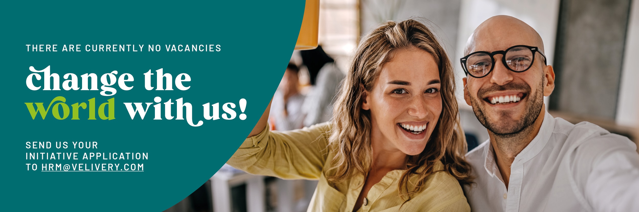 Two smiling people in an office with a call for initiative applications